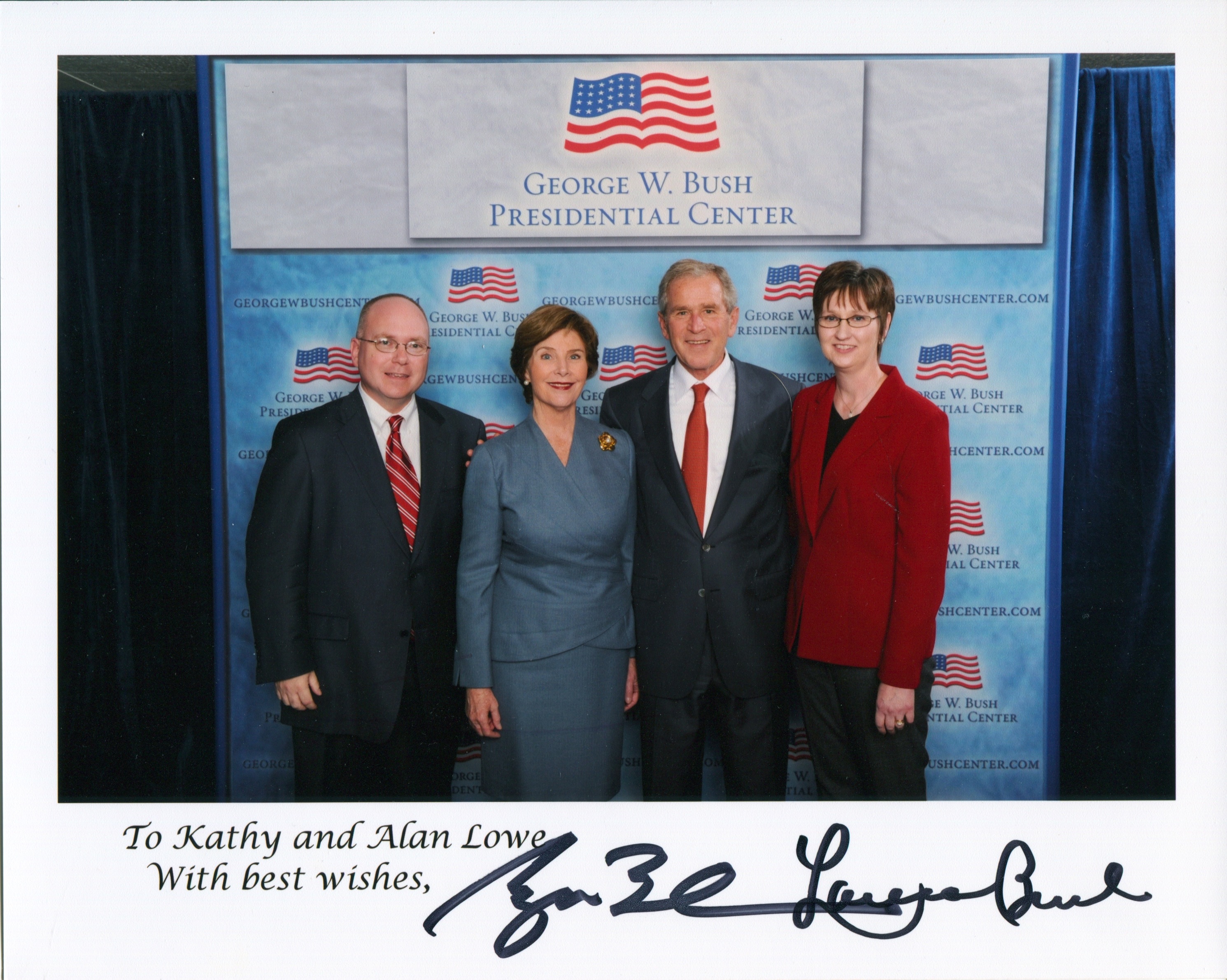 UK alum Alan Lowe works with former President George W. Bush. 